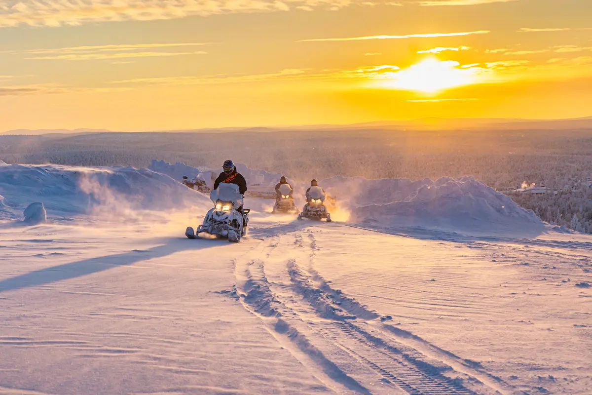 Saariselka Finland Star Arctic Sunset Snowmobiling.