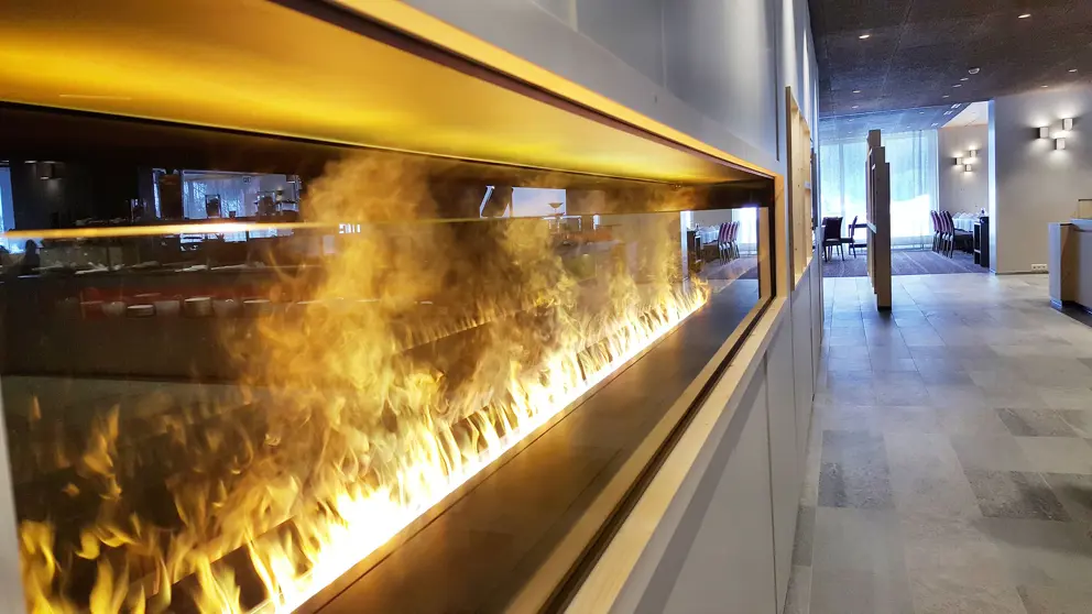 Hotel Sunstar Grindelwald Restaurant Fireplace [5]
