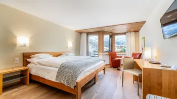 Hotel Allalin Saas Fee Superior Double Bedroom Copyright Puzzlemedia.Ch