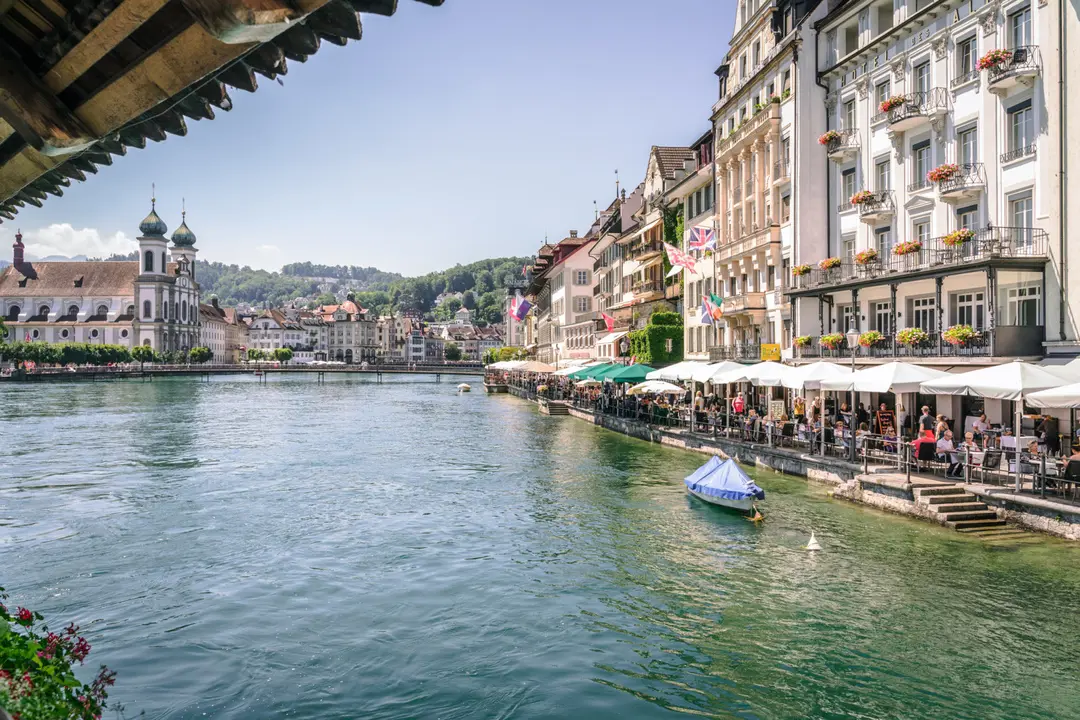 City Of Lucerne Rathausquai In The Background The Jesuit Church ©Luzern Tourismus/Laila Bosco