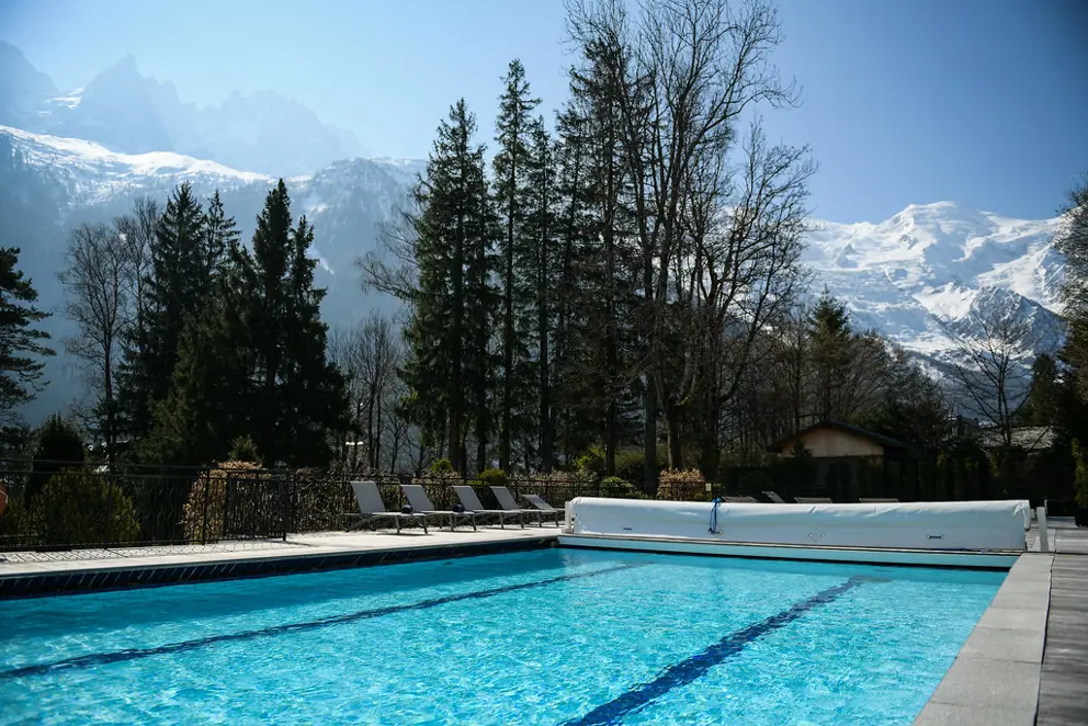 La Folie Douce Hotel Chamonix France Outdoor Pool with snow capped montains [8]