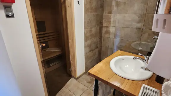 Glamping pod shower room with infrared sauna