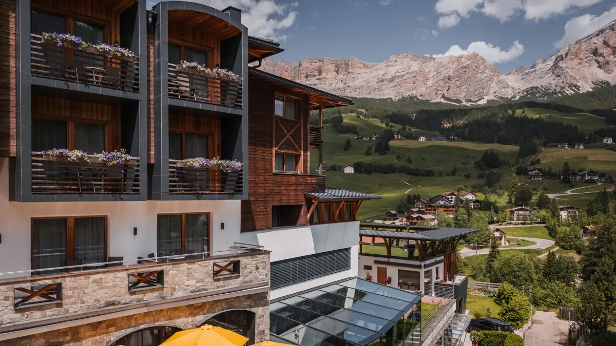 Soleil Alpine Lifestyle Hotel La Villa Italy Exterior with Dolomite mountain views 