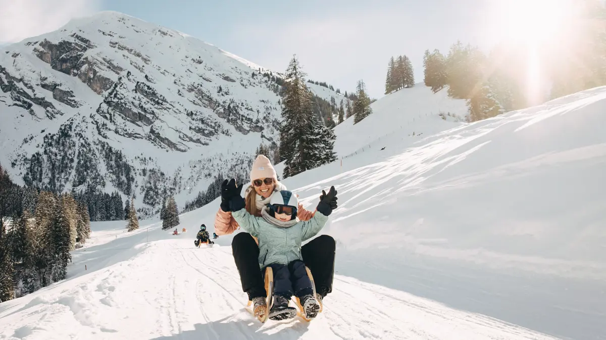 Sledding Mother Child Winter Snow©Phil Wenger