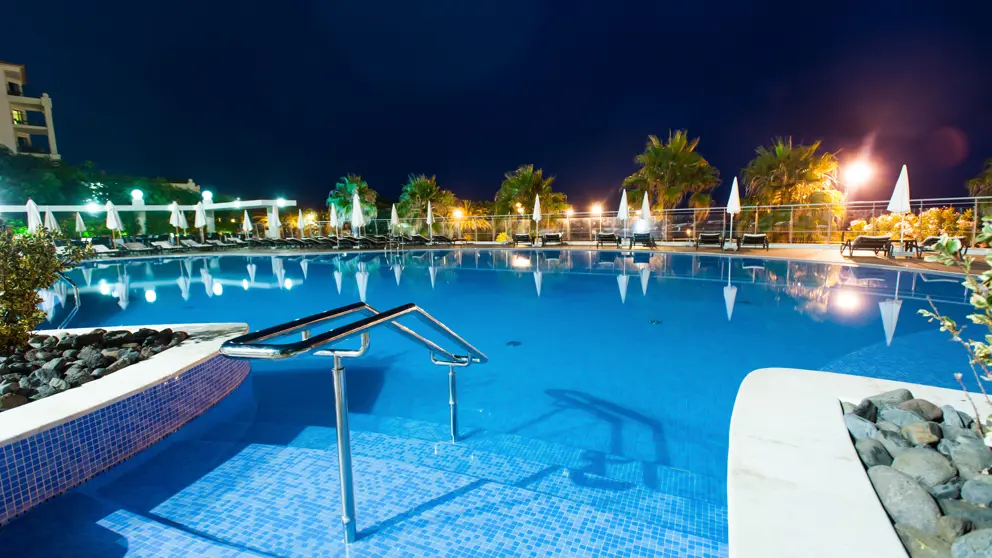 Melia Madeira Mare Resort Spa Funchal Outdoor Swimming Pool At Night [4]