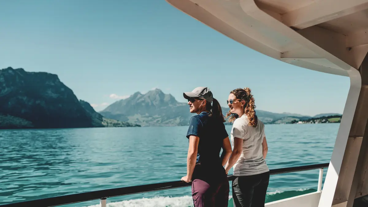 Lucerne Passengers On A Boat With Pilatus And Hammetschwand In The Background 