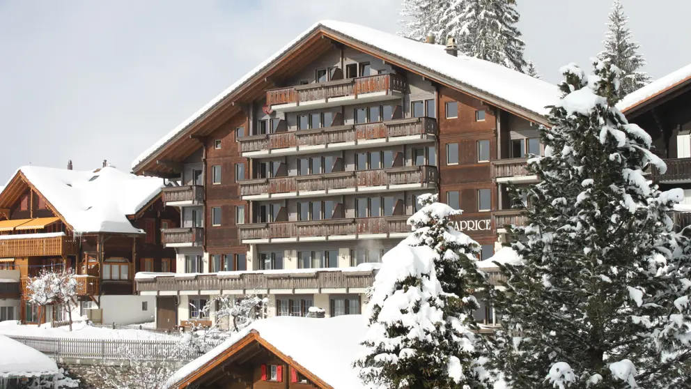 Hotel Caprice Wengen Hotel Building Exterior [1]